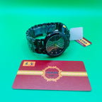 IRADD black Watch 8038  on a green background with a red card featuring 'TRADD VIP' branding.